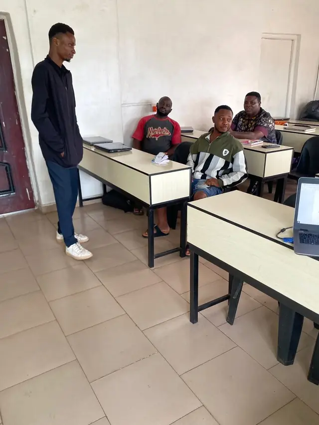 Nergy instructor addressing students at the start of a live training class
